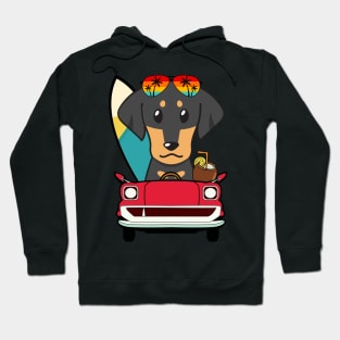 Surfer dachshund driving to the beach Hoodie